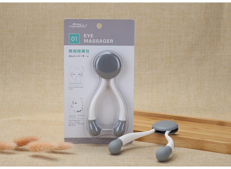 Lameila wholesale ball eye roller massage device tool beauty remove eye bags dark circles touch manual eye massager M1099