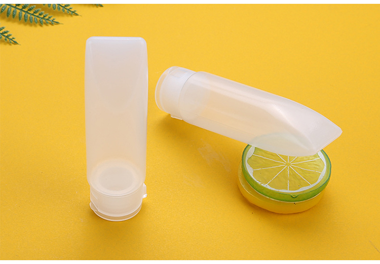 Lameila Brand Wholesale Cosmetic Packaging Travel Plastic Cream Bottle Pet 60ml Beauty Filp Cover Empty Bottle LM112