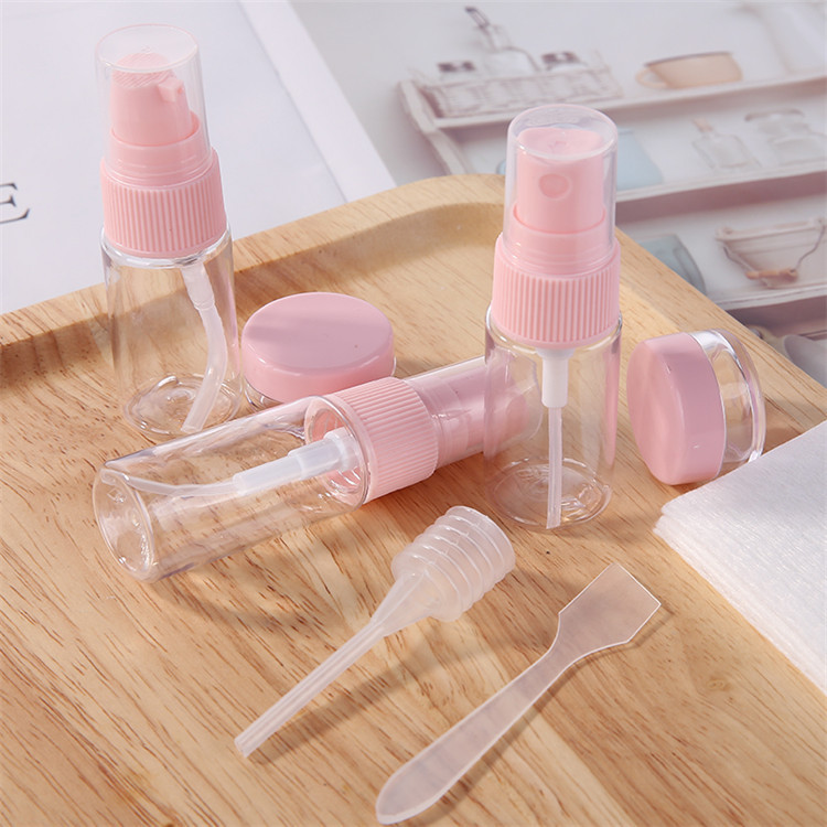 Hot Sale Eco-friendly Make Up Cosmetic Travel Bottle Kit 9pcs Lotion Spray Bottle Plastic Travel Set With Pink Lid MDL551